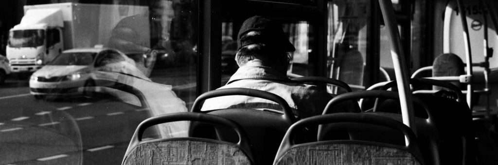 man sitting on bus